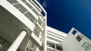carrier-white-building-against-blue-sky