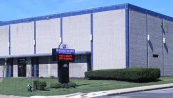 carrier-exterior-stone-building-with-signage-sm