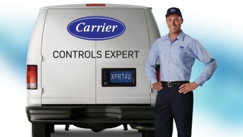 carrier-controls-expert-standing_-in-front-of-service-van