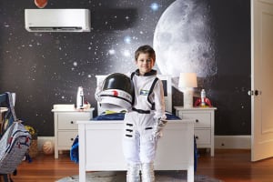 child-in-astronaut-suit-in-kids-space-room-3x2