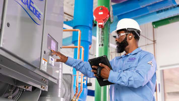 hvac-service-tech-with-tablet