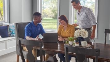 dealer-couple-dining-table-laptop-16x9