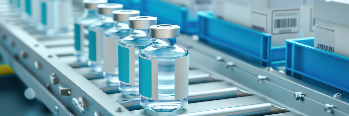 vaccine vials on shipping assembly line