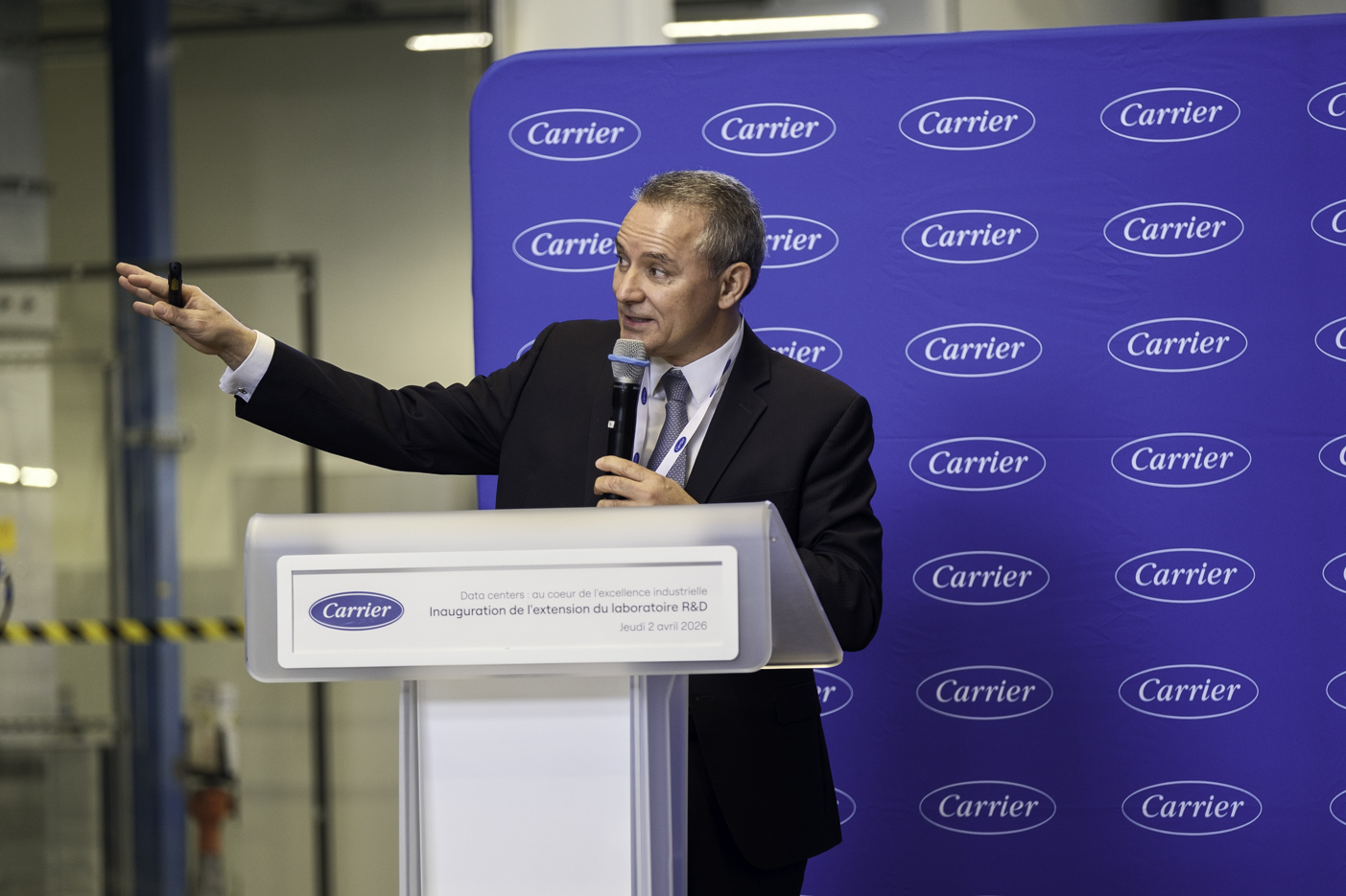 GENOIS, Didier speaking at the inauguration of Carrier’s Montluel R&D laboratory extension Didier Genois speaking at the inauguration of Carrier’s Montluel R&D laboratory extension, at a podium in front of a Carrier-branded backdrop
