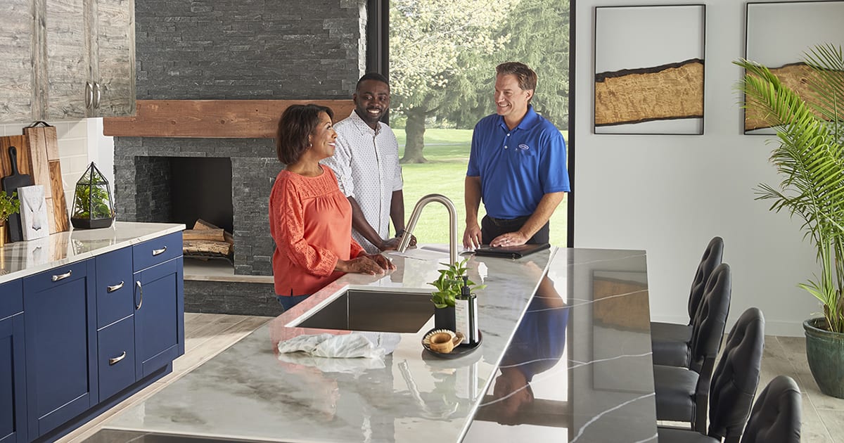 a carrier dealer explains to homeowners what does a dehumidifier do and how do dehumidifiers work 