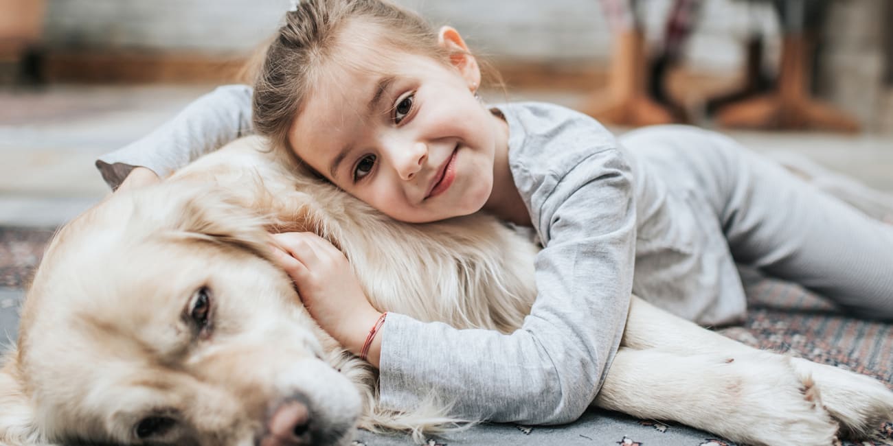 girl and dog enjoying home with high indoor air quality