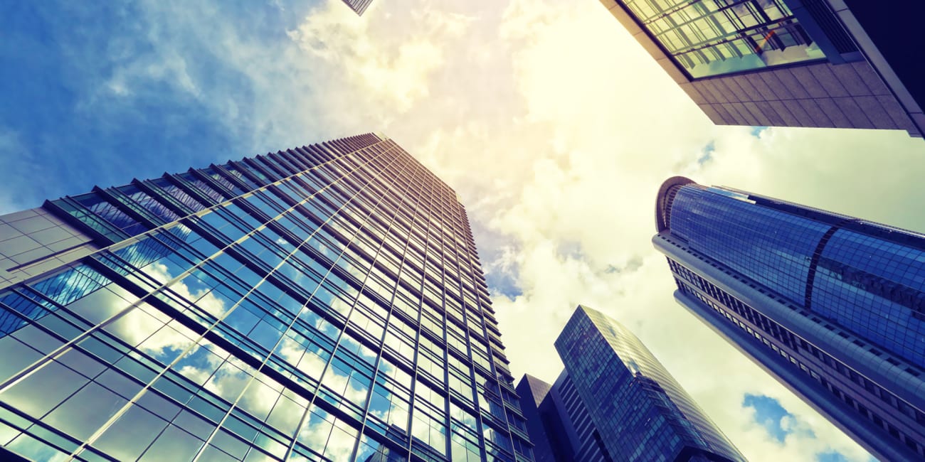 carrier-group-of-highrise-buildings-in-city-looking-up-service-card