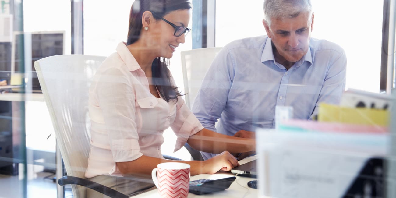 businesswoman-businessman-working_sq