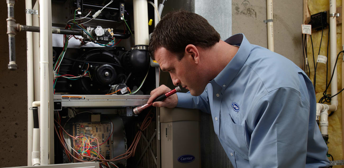 A carrier dealer investigating burning smell in house.