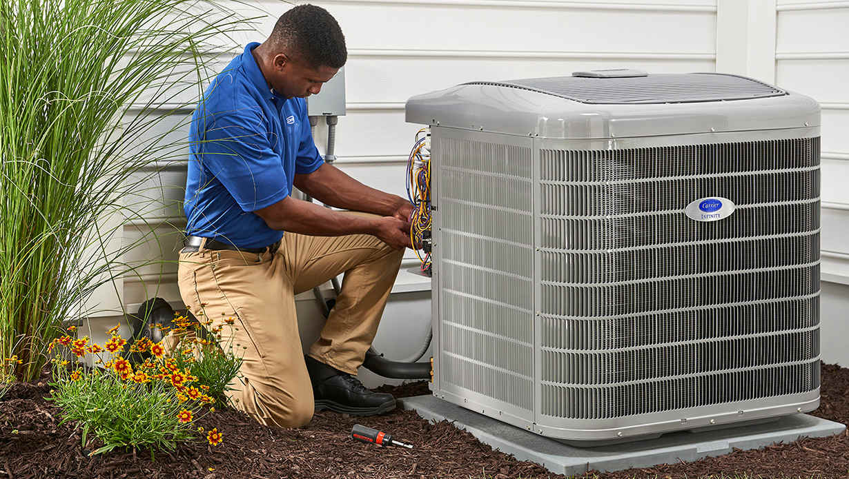 a carrier dealer with nate certification checks a/c unit