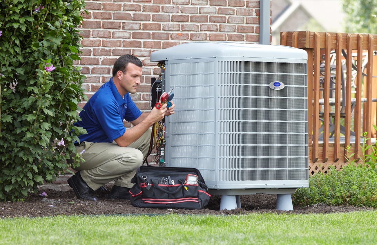 a carrier dealer performs heat pump troubleshooting of heat pump problems