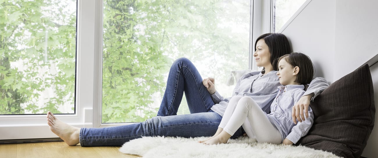 a woman and son sit and enjoy the benefits of a furnace humidifier