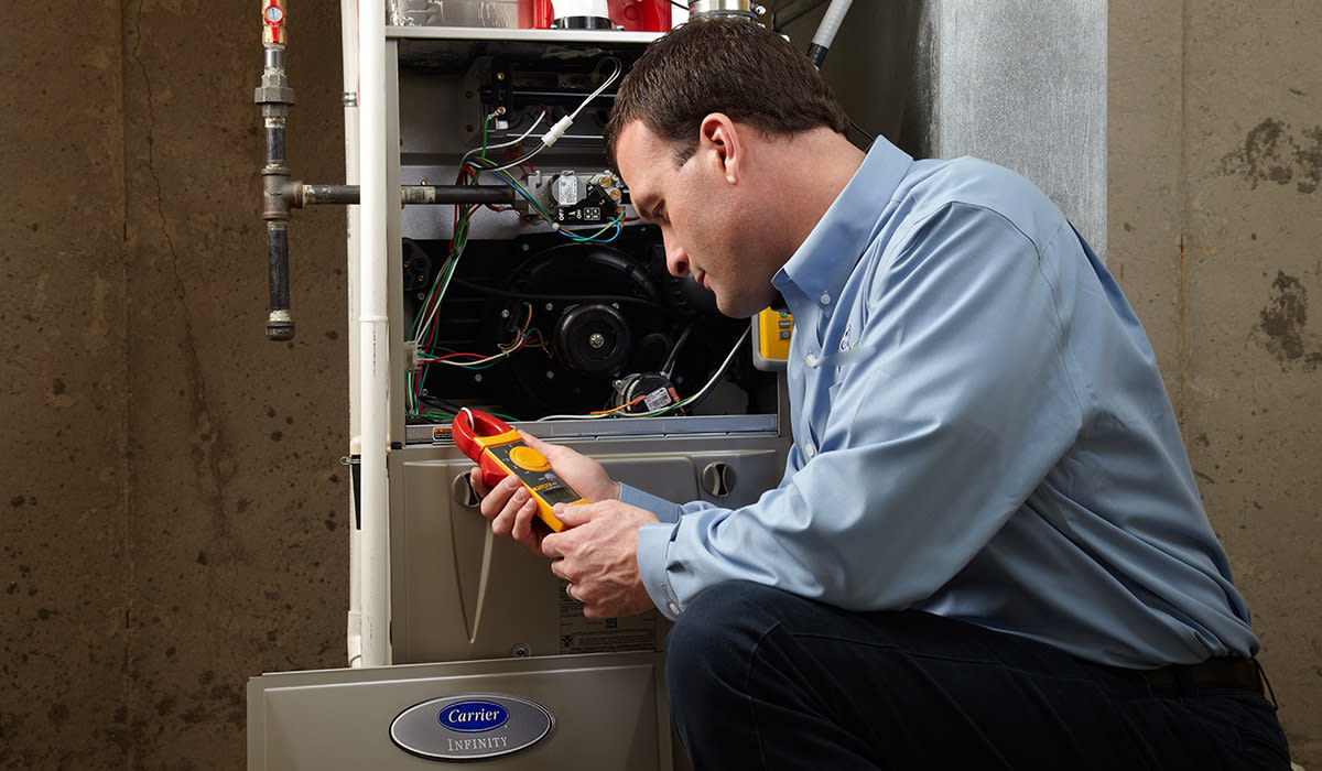 a carrier dealer performs furnace troubleshooting