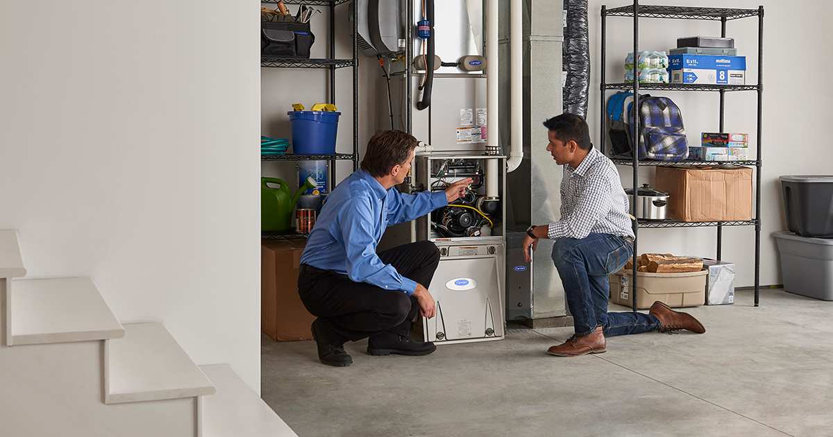 carrier dealer inspects furnace short cycling with homeowner
