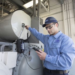 carrier-technician-evaluating-hvac-equipment