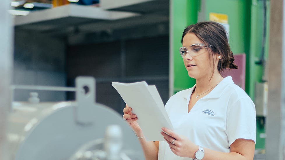 carrier-woman-reading-document