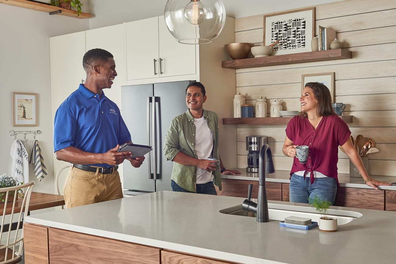 dealer-with-couple-in-the-kitchen-ipad