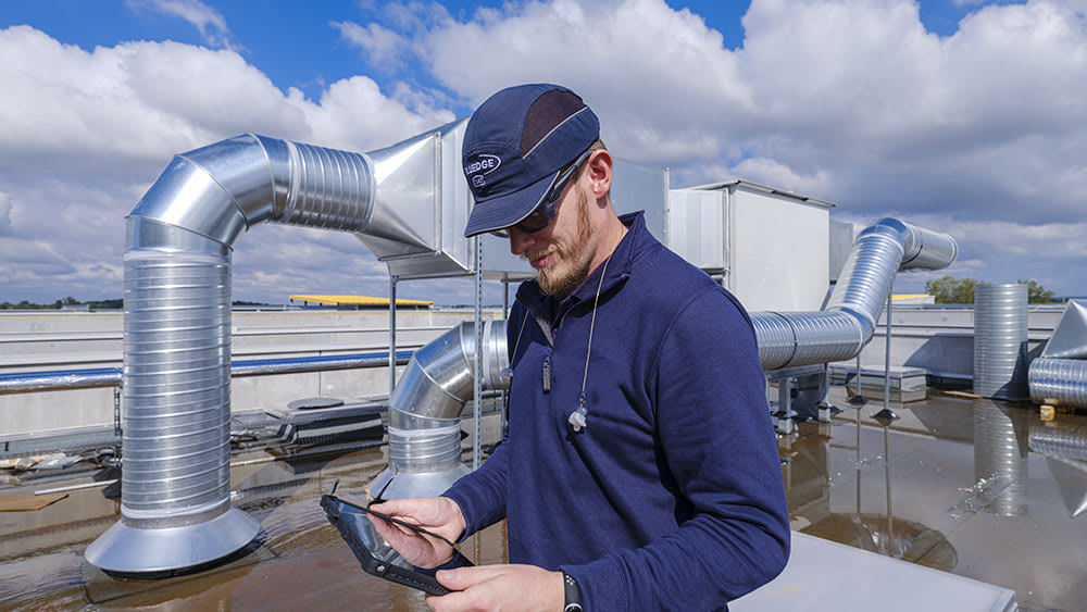 hvac-service-tech-with-table-c