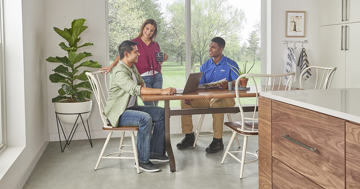 a-carrier-dealer-explains-r-454b-refrigerant-to-a-couple