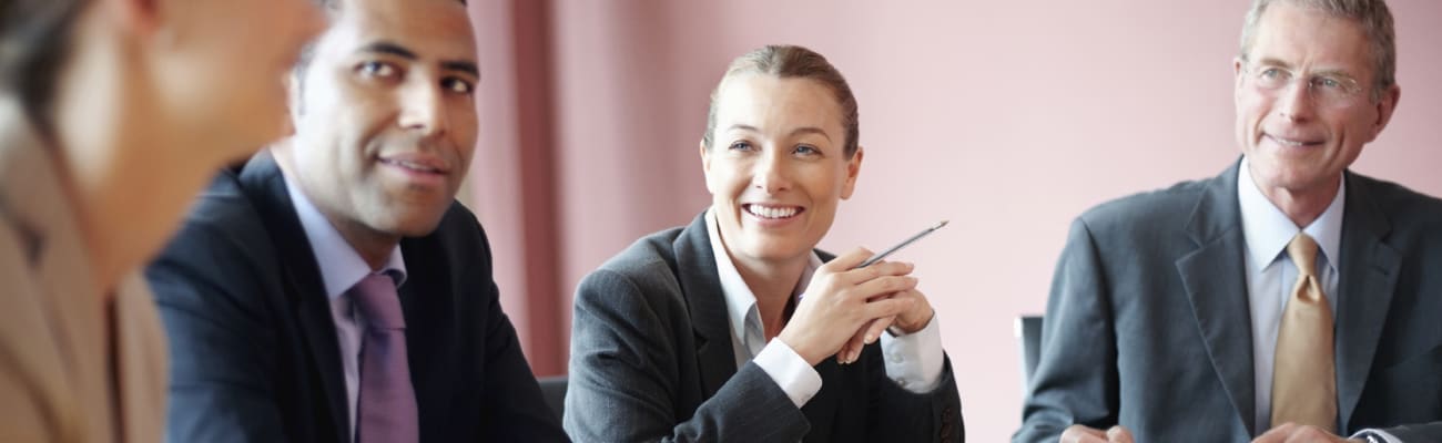carrier-group-of-business-people-around-a-table-crop-b