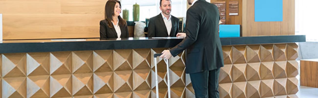 businessman_making_booking_c