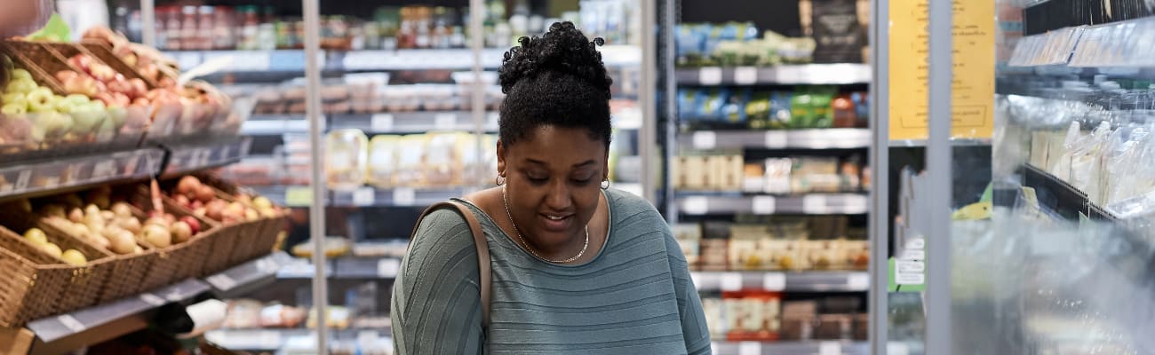 mom-and-daughter-buying-grocery