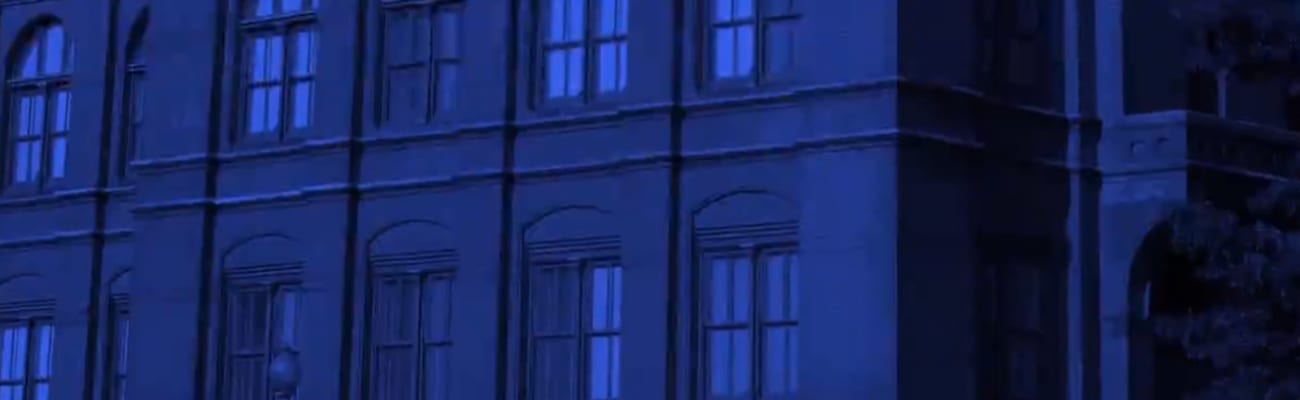 carrier-sidney-yates-building-exterior-with-blue-bg