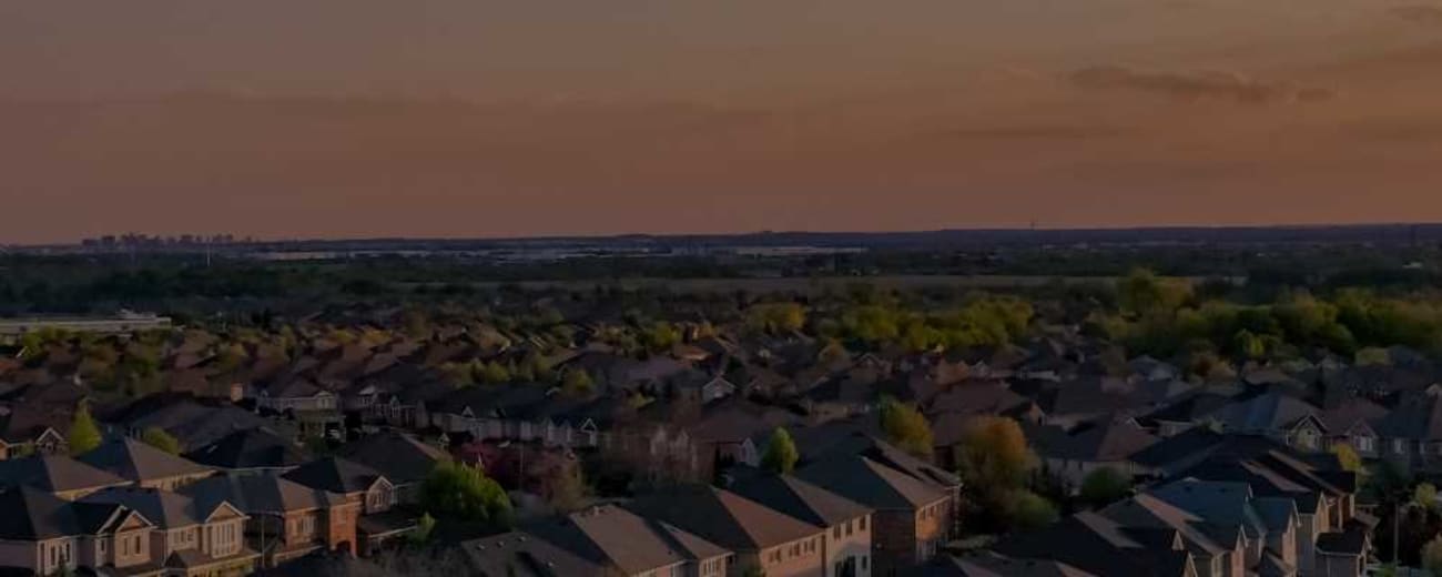 residential-neighborhood-aerial-view-with-open-sky-5x2
