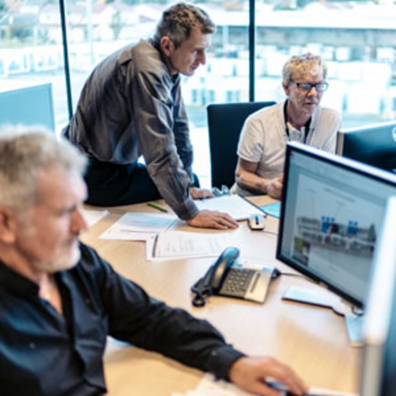 employees on computers