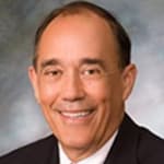 Close up portrait of St. Louis REALTORS CFO Rick Capelli with quote about Supra remote installation