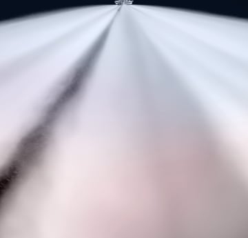 Water mist discharge with a Marioff HI-FOG sprinkler.