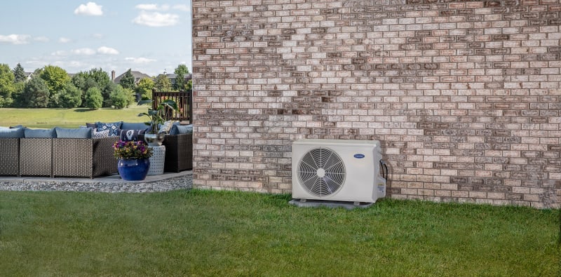 A ductless mini split outside of home after a mini split cleaning.