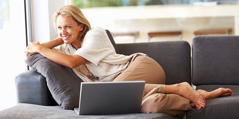 happy-woman-lounging-in-ventilated-living-room