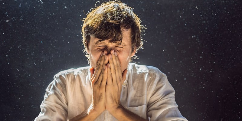 man-sneezing-indoor-air-quality