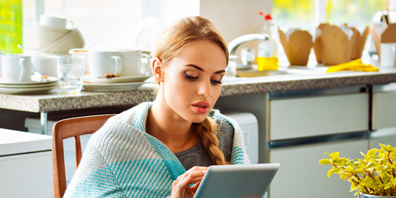 woman-on-tablet-at-table-with-shawl-3x2