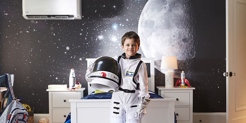 child-in-astronaut-suit-in-kids-space-room-3x2