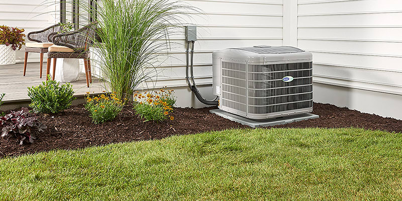 carrier-infinity-outdoor-unit-in-the-garden-3x2