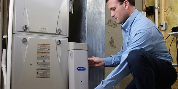 carrier-dealer-changing-air-purifier-filter