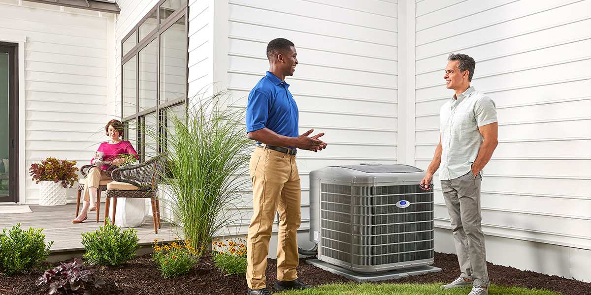 a-carrier-dealer-discusses-benefits-of-uv-lights-for-air-conditioner-with-a-homeowner