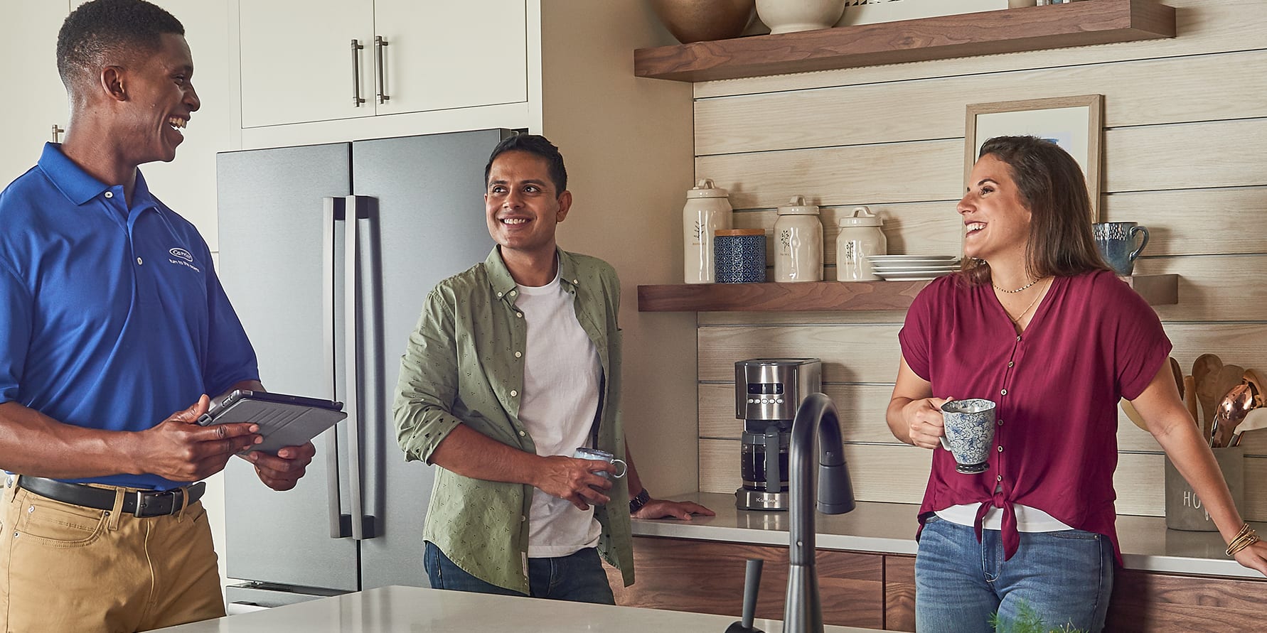 carrier-dealer-discuss-heating-system-with-homeowners