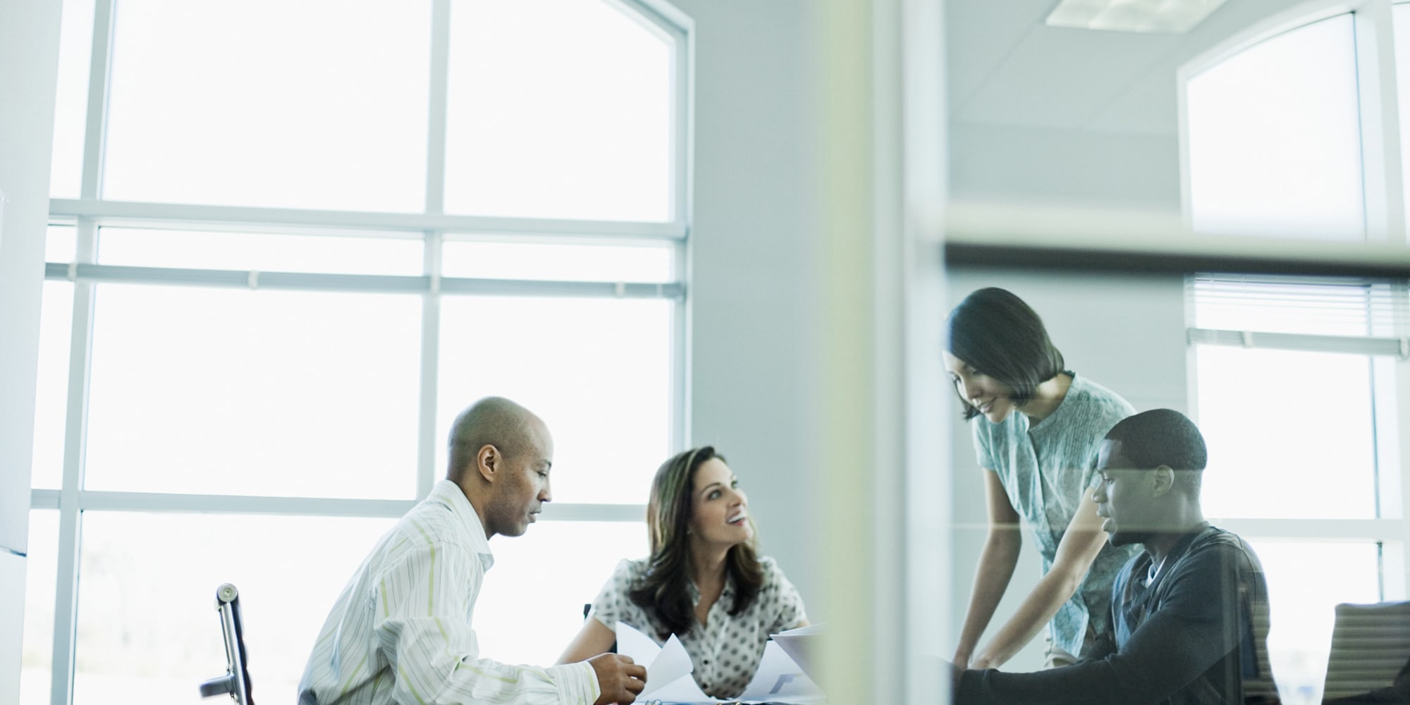 carrier-colleagues-working-together-in-conference-room