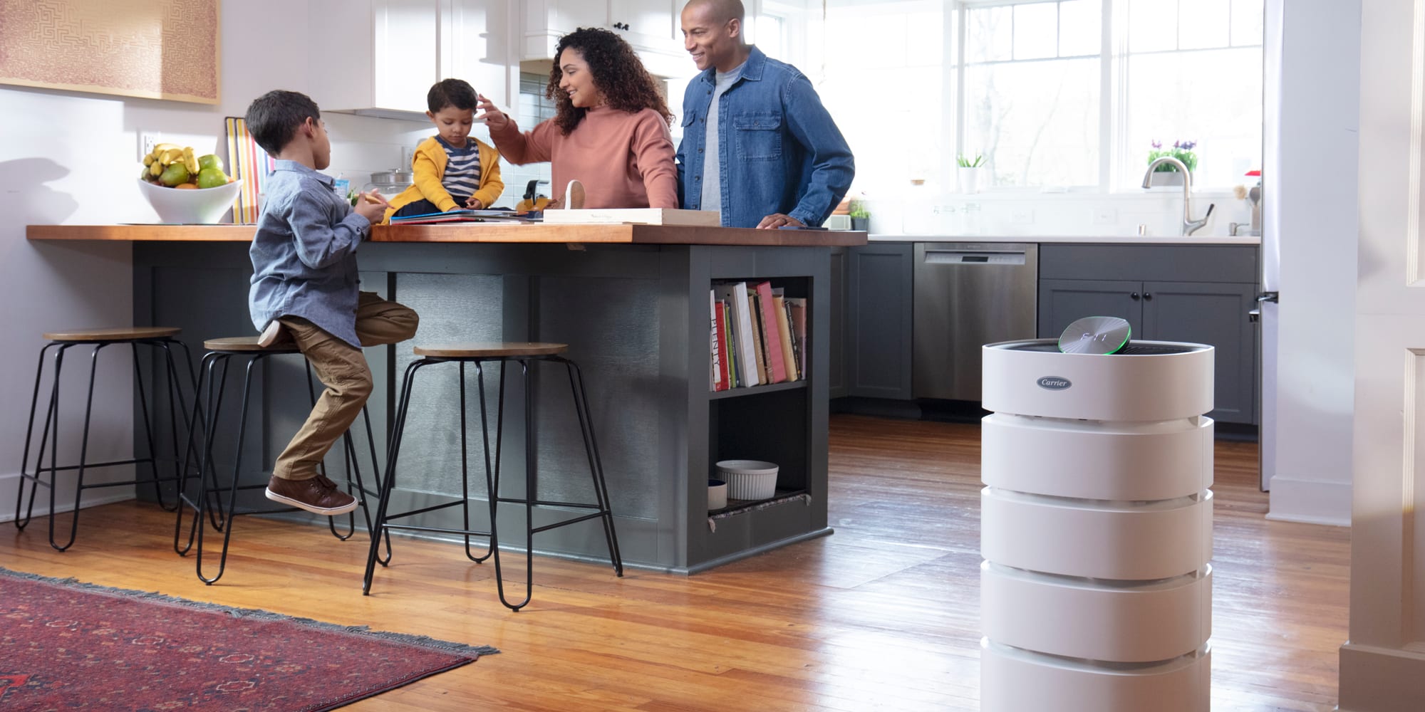 family-in-kitchen-with-room-air-purifier-16x9