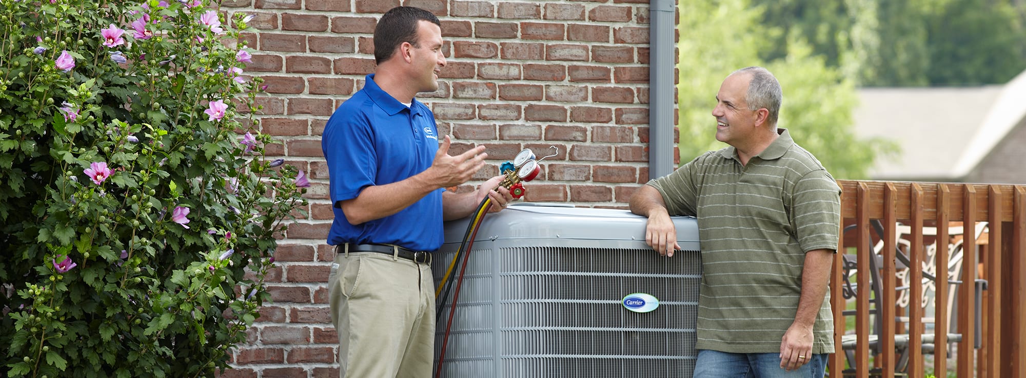 dealer-and-man-standing-next-to-heat-pump dealer-and-man-standing-next-to-heat-pump