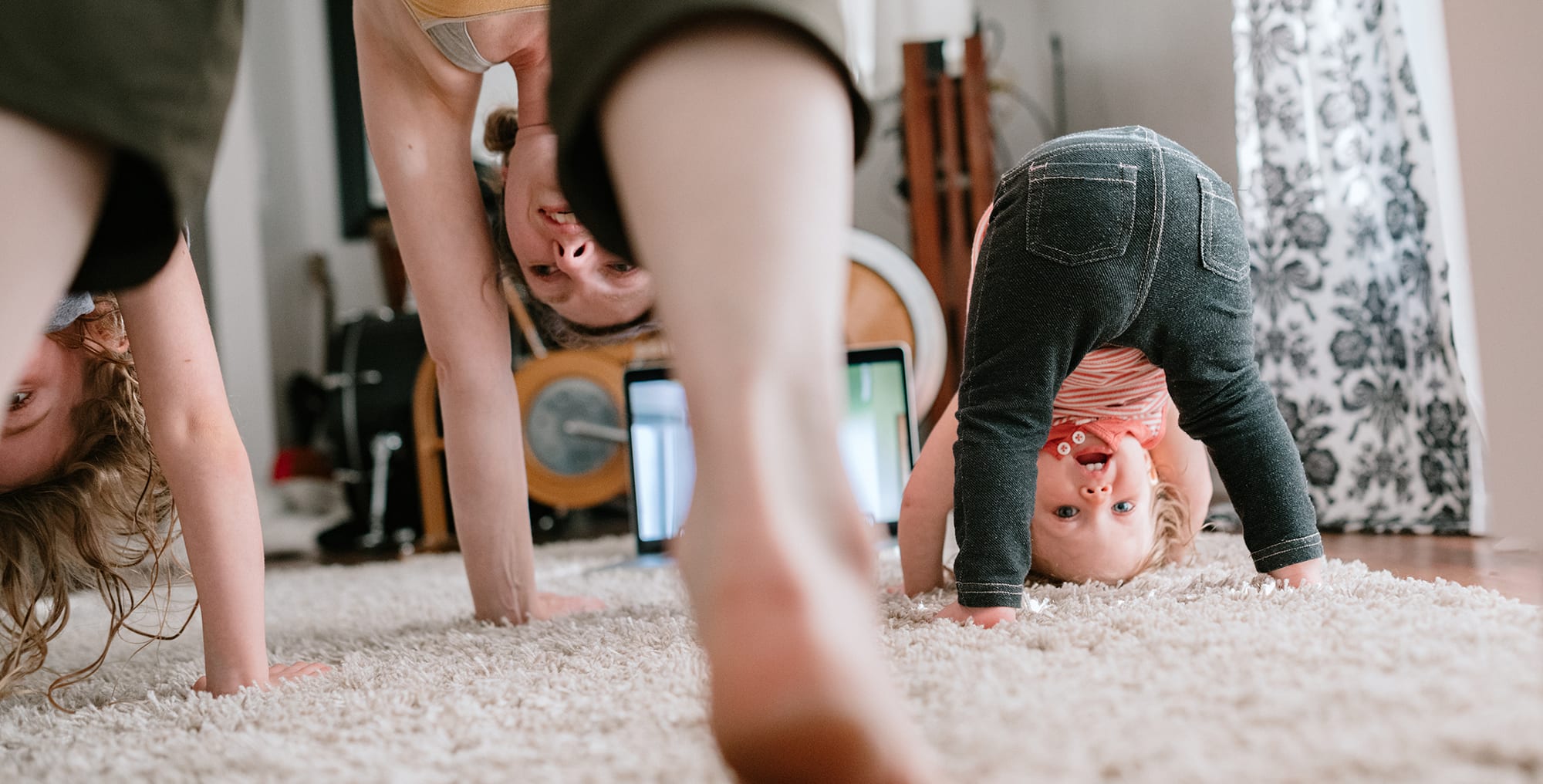 mom-and-kids-do-head-stands-on-carpet mom and kids do headstands on carpet after learning how to clean evaporator coils