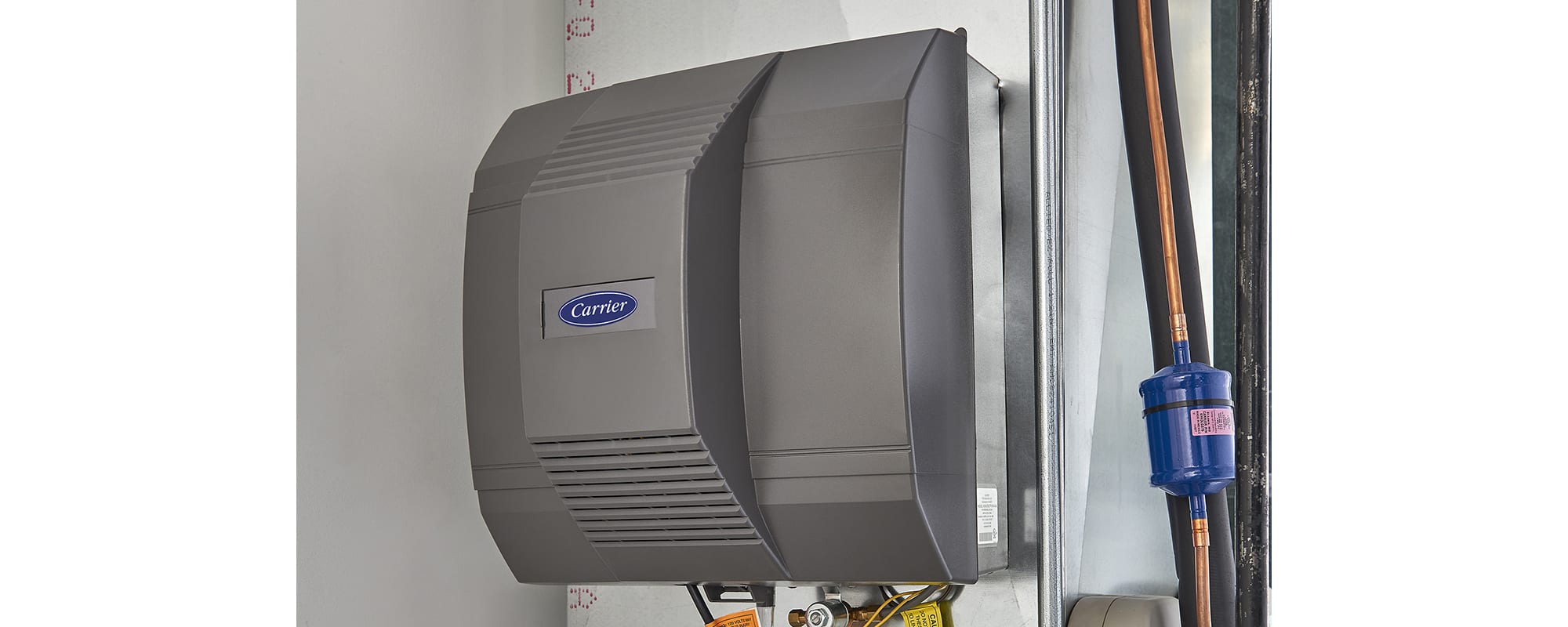 furnace-humidifier-pros-and-cons humidifier for furnace installed in a home