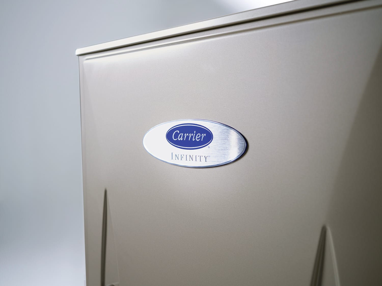 gas-furnace-service Carrier dealer inspecting a furnace during a gas furnace service call