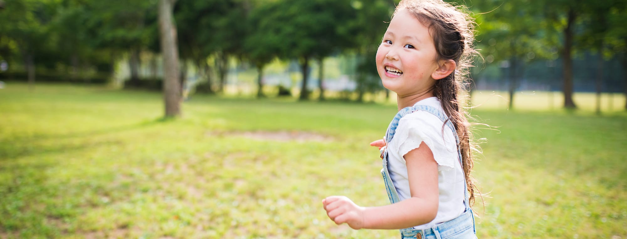 a girl playing in backyard after parents considered geothermal heat pump cost a girl playing in backyard after parents considered geothermal heat pump cost
