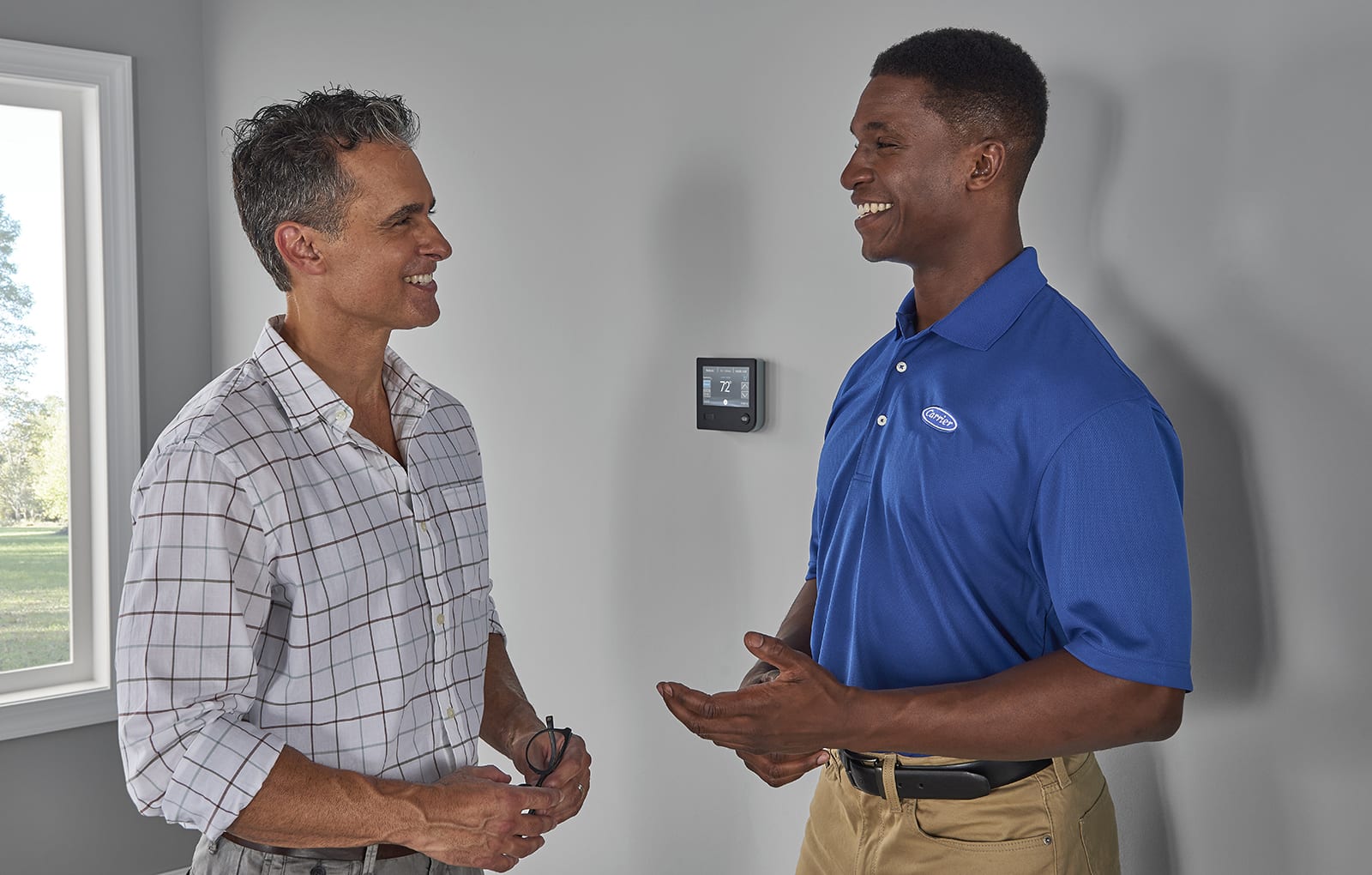 a carrier dealer explains an evaporator coil vs condenser coil to a homeowner a carrier dealer explains an evaporator coil vs condenser coil to a homeowner