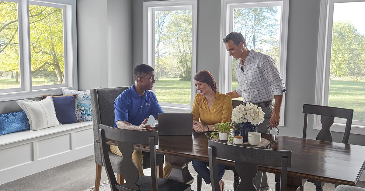 a carrier dealer explains how to clean an evaporator coil to a couple a carrier dealer explains how to clean an evaporator coil to a couple
