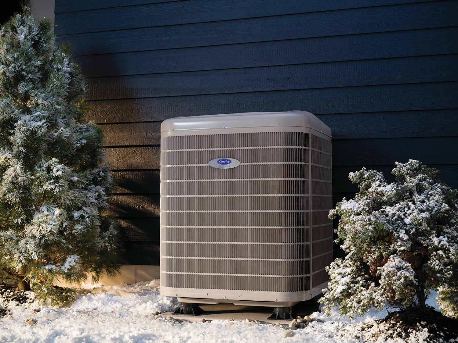 an hvac installation outside of a home in winter an hvac installation outside of a home in winter